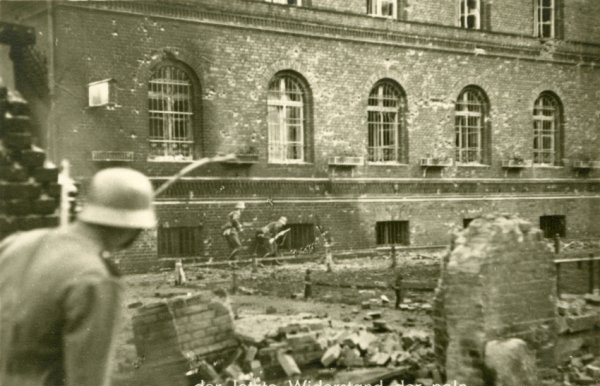 German troops creep up the side of the front of the Polish Post Office