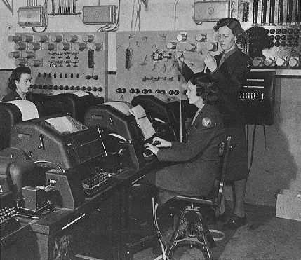 WACs operate teletype machines during World War II.
