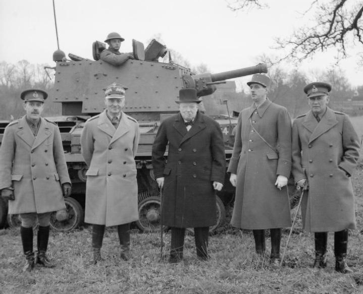 Winston Churchill with General Władysław Sikorski, Prime Minister of the Polish Government-in-Exile and Commander-in-Chief of the Polish Armed Forces and General Charles de Gaulle, General Officer Commanding French Forces, following a Cruiser Mk IIA CS (A10) tank demonstration.