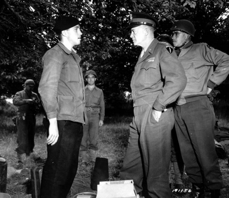 Eisenhower and Bradley with a member of the French Resistance in Normandy