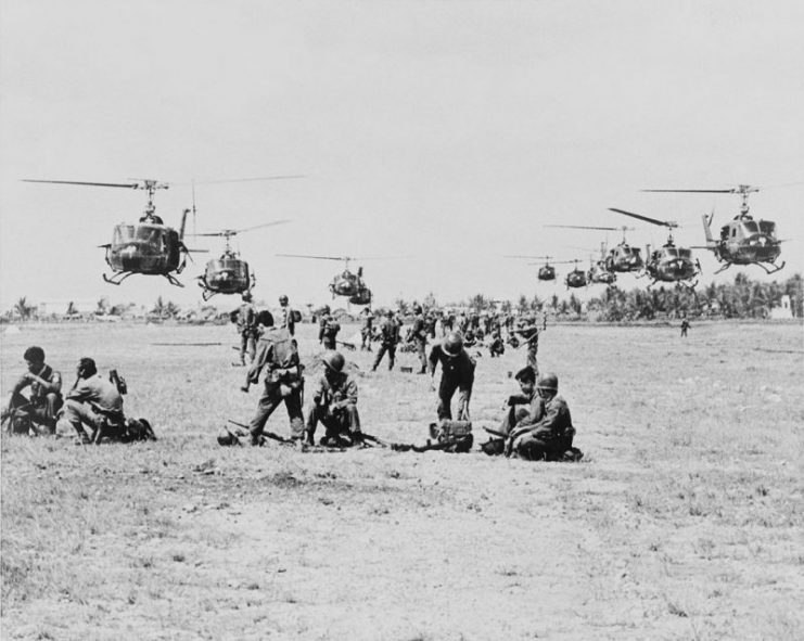 U.S. Army Bell UH-1D Huey helicopters arriving to airlift Vietnamese government Rangers of the 43rd Battalion into battle against Viet Cong guerrillas, Saigon, 1965.
