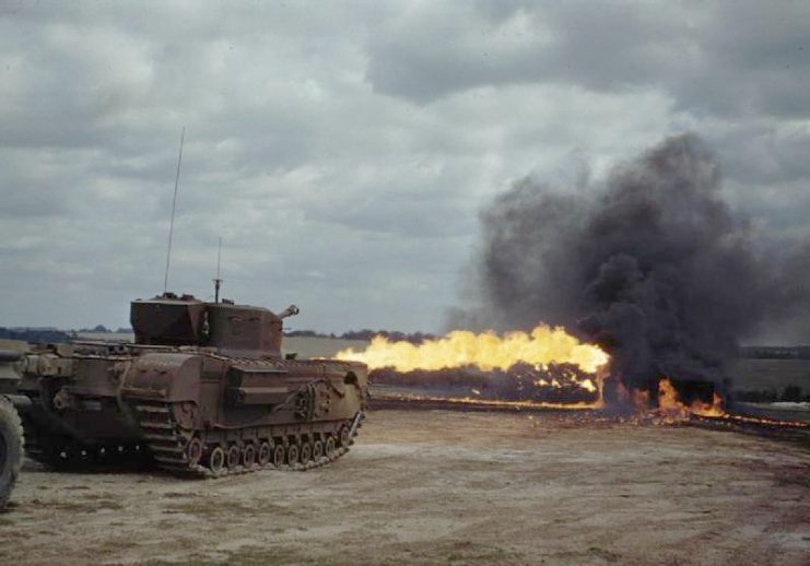 A Churchill tank fitted with a Crocodile flamethrower in action. This flamethrower could produce a jet of flame exceeding 150 yards in length