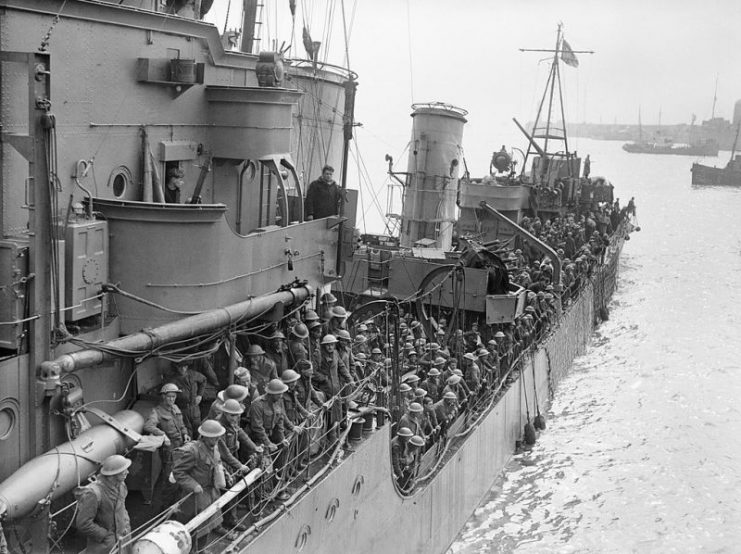 Troops evacuated from Dunkirk on a destroyer about to berth at Dover, 31 May 1940.