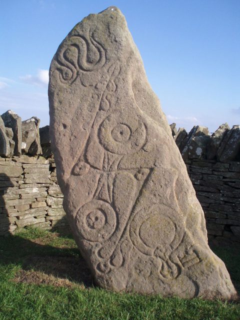 The Aberlemno Serpent Stone, Class I Pictish stone with Pictish symbols, showing (top to bottom) the serpent, the double disc and Z-rod and the mirror and comb Photo by Catfish Jim and the soapdish CC BY-SA 3.0