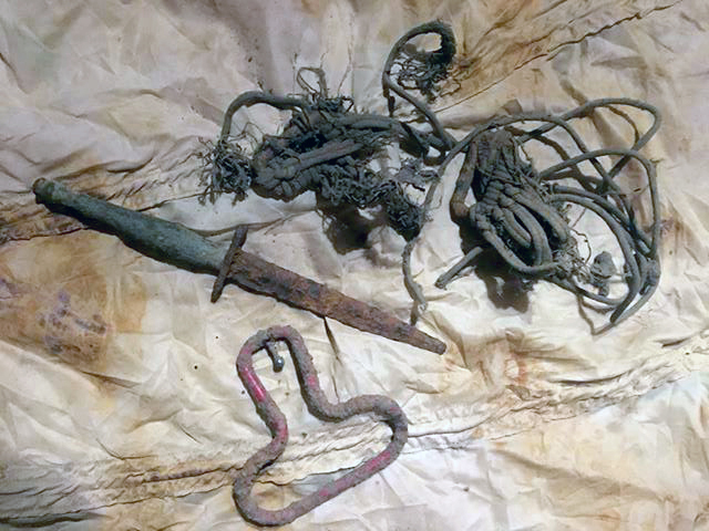 The dagger was discovered while metal detecting. Next to it were elements of US army parachute.