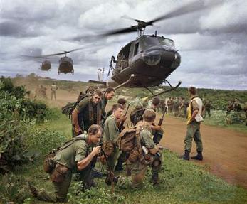 Australian soldiers from 7 RAR waiting to be picked up by US Army helicopters following a cordon and search operation near Phước Hải on 26 August 1967.