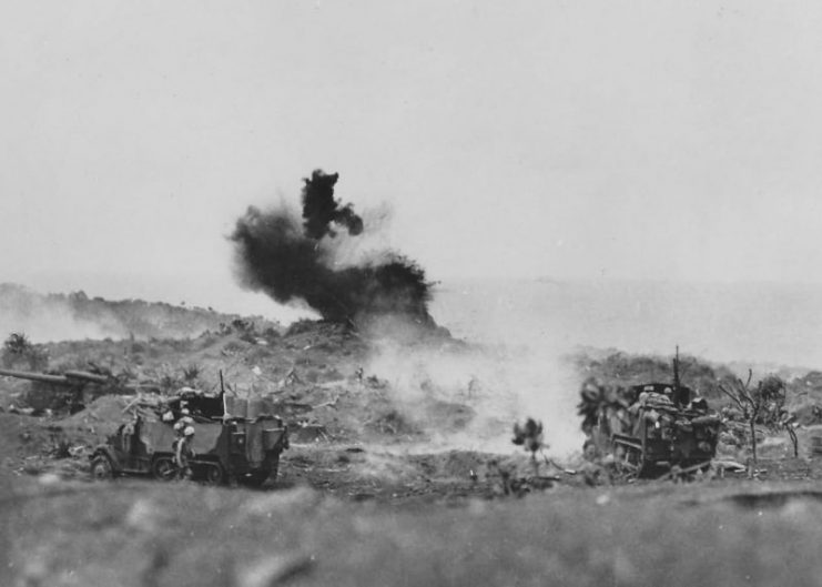 Marines with a GMC M3 half-track in action Iwo Jima 1945