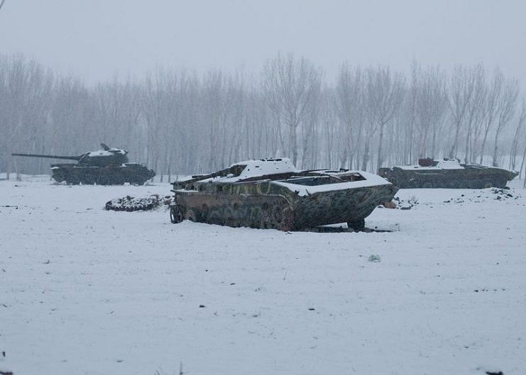 Russian tanks left over from the Soviet invasion sit in an open field next to an Afghan National Army compound in Bamyan province, Afghanistan.