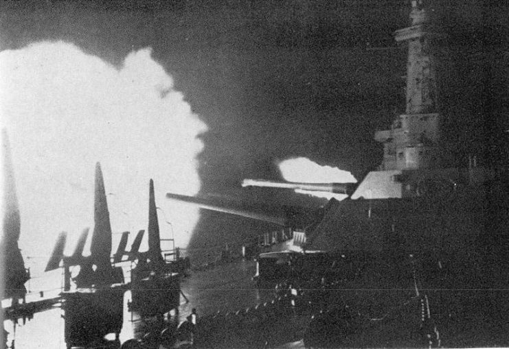 The U.S. battleship USS Washington (BB-56) firing upon the Japanese battleship Kirishima, during the Naval Battle of Guadalcanal on 14-15 November 1942.