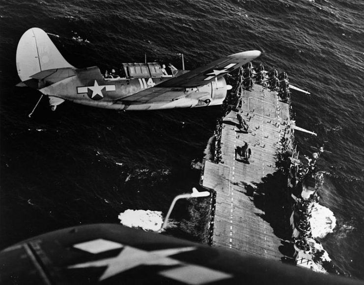 Two SB2C Helldiver above Hornet