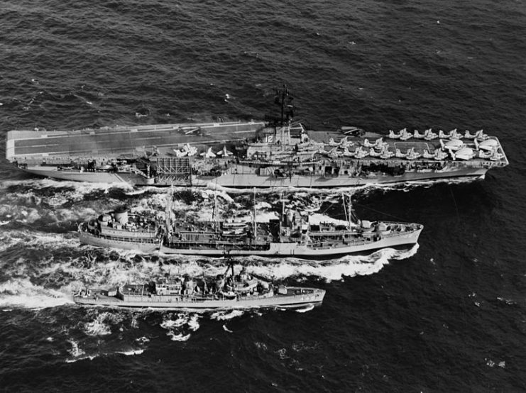 Underway Replenishment with the USS Hornet (CVS-12), USS Comarron(AO-22), and USS Nicholas (DD-449)