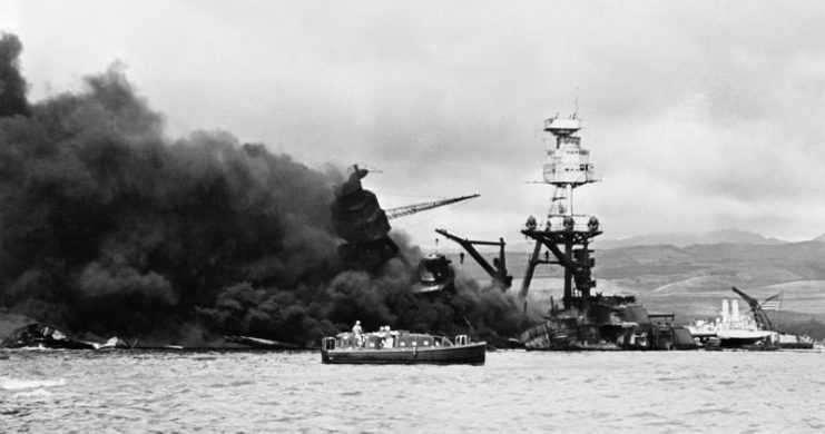 The burning wreckage of the U.S. Navy battleship USS Arizona (BB-39) at Pearl Harbor, Hawaii.
