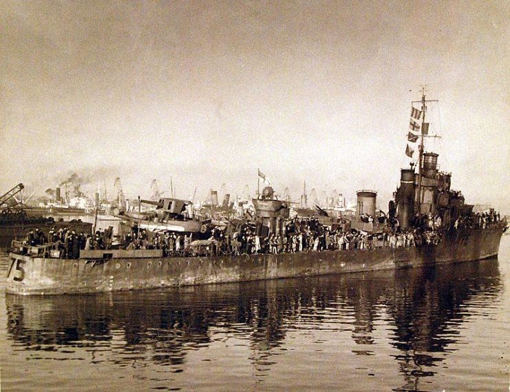 Royal Navy ship, HMS Venomous (D 75), with survivors of HMS Hecla at Casablanca, Morocco, November 17, 1942. Hecla was a destroyer depot ship and was sunk during this operation on November 12, 1942 by German submarine U-515.