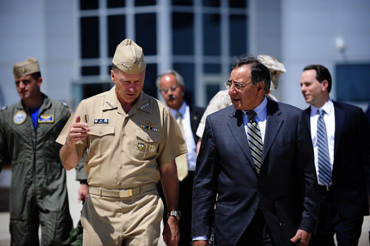 Secretary of Defense Leon E. Panetta walks with Commander of North American Aerospace Defense Command and U.S. Northern Command Adm. James Winnefeld Jr. during a visit to Peterson Air Force Base, Colo., on July 29, 2011.