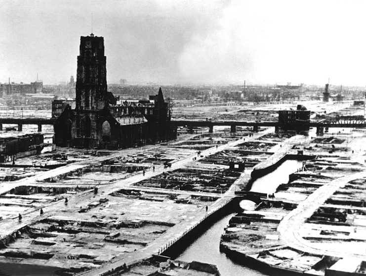 Rotterdam’s city center after the bombing. The heavily damaged (now restored) St. Lawrence church stands out as the only remaining building reminiscent of Rotterdam’s medieval architecture.