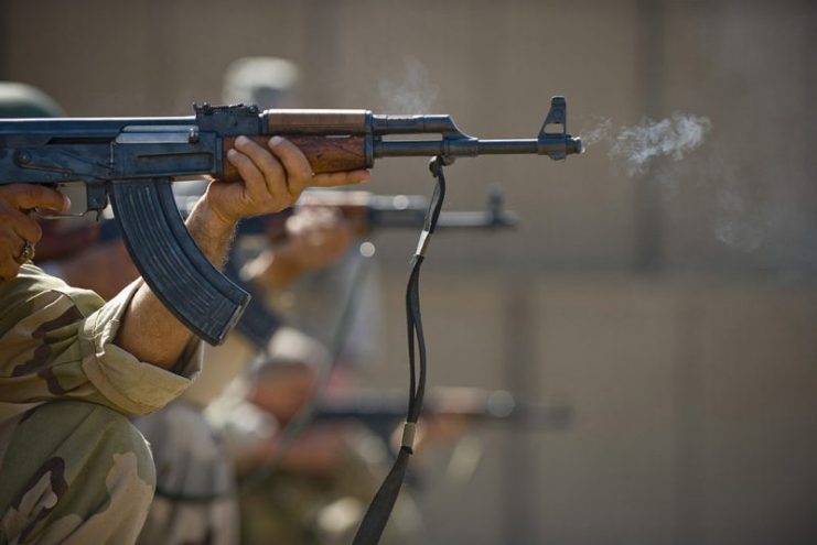 Iraqi airmen fire AK-47s during firing drills March 29, 2011.