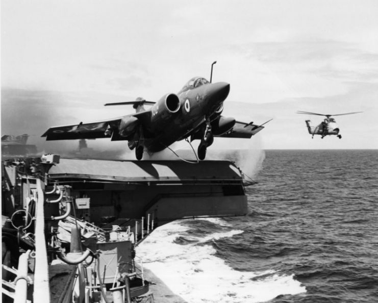 A Blackburn Buccaneer S.2 launches from an aircraft carrier.