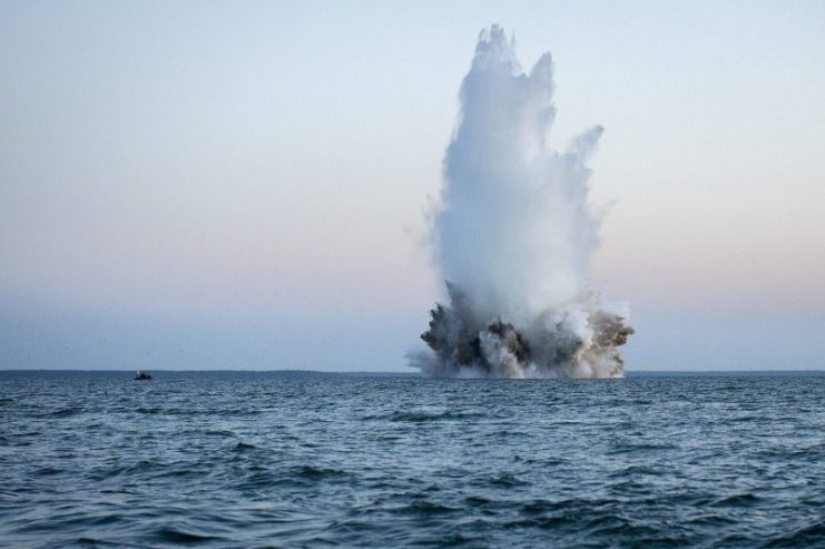Members of Latvia Explosive Ordnance Disposal (EOD) detonate a World War II-era German Bottom-Mine (LMB) using demolition charges, while conducting mine countermeasure operations in the Baltic Sea off the coast of Estonia, May 25. Photo: U.S. Navy photo by Mass Communication Specialist 2nd Class Patrick A. Ratcliff/Released