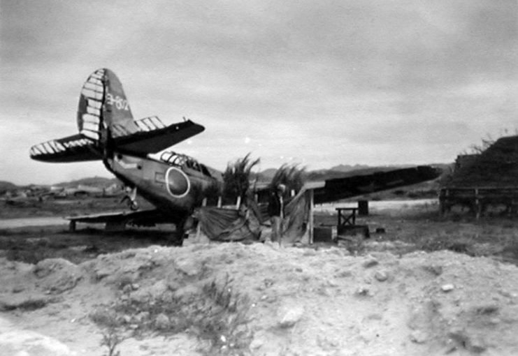 A shot down U.S. Navy Curtiss SB2C Helldiver set up as a Japanese decoy plane at Yokosuka naval air base.1945