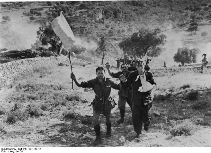 Italian soldiers surrender to the British, 1943. By Bundesarchiv – CC BY-SA 3.0 de