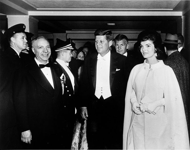 President John F. Kennedy and First Lady Jacqueline Kennedy, wearing a gown designed by Ethel Franken of Bergdorf Goodman, arrive at the D.C. Armory in Washington D.C. for an inaugural ball held on the evening of Inauguration Day, January 20, 1961.