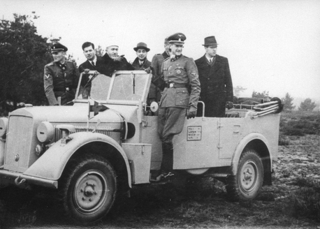 Haj Amin el-Husseini reviewing SS 13th Division soldiers from a car. Photo by Bundesarchiv-Koblenz Collection: Yad Vashem Photo Archive