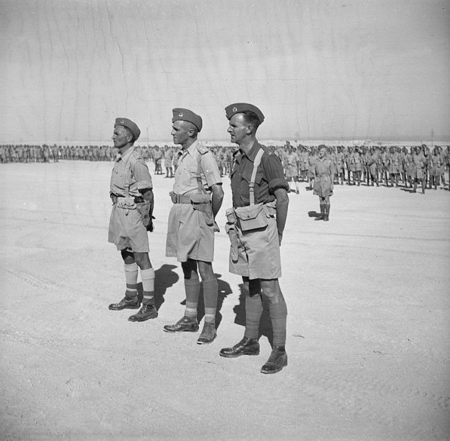 Presentation of awards to 3 members of a NZ Brigade in the Western Desert by the Commander in Chief of the Middle East Forces. L to R: Lt Charles Hazlitt Upham, Lt Col Howard Karl Kippenberger, Major Raymond James Lynch. Taken at Baggush on 4 November 1941 by an official photographer.