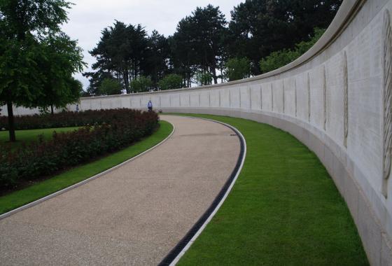 Wall of the Missing at Normandy American Cemetery in France. American Battle Memorial Commission