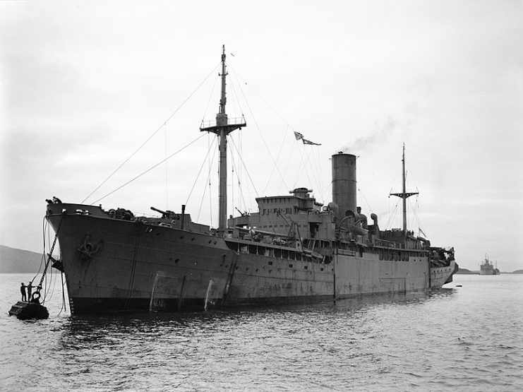 The auxiliary minelayer HMS AGAMEMNON, a former Blue Funnel Liner, moored at a minelaying base on the Kyle of Lochalsh.