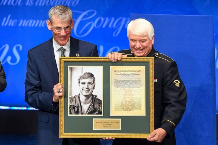 Acting Secretary of the U.S. Army Robert M. Speer presents a citation to former Spc. 5 James C. McCloughan during the Medal of Honor Induction Ceremony at the Pentagon, in Arlington, Va., Aug. 1, 2017. (U.S. Army photo by Sgt. Alicia Brand)