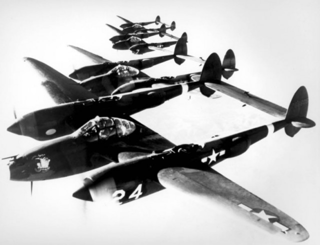 Four P-38Hs flying in formation