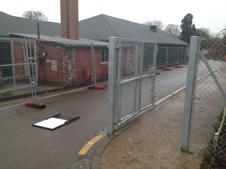 Fence said to separate Bletchley Park from National Museum of Computing.