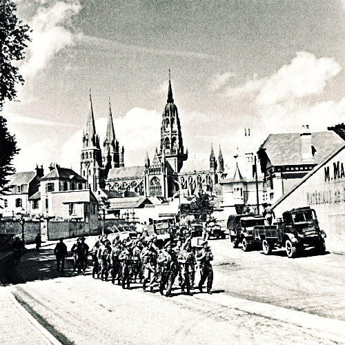 British troops as they marched through French town Bayeux shortly after the D-Day landings - June 27, 1944.