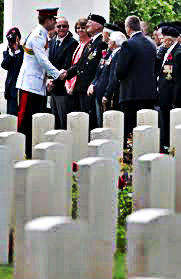 Prince Harry (in white uniform) with WWII veterans during the Battle in Monte Cassino commemoration.