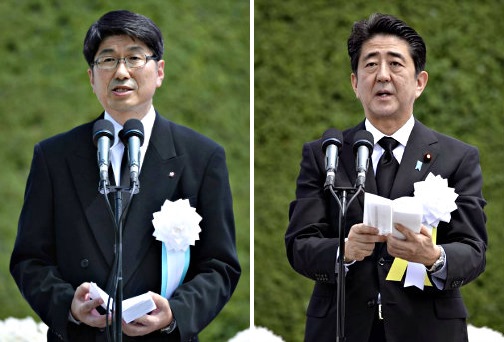 Nagasaki Mayor Tomihisa Taue (left) and Japanese PM Shinzo Abe during their speeches on the 69th-year anniversary of the Nagasaki Atomic Bombing.
