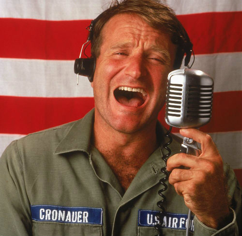 Robin Williams as Adrian Cronauer in Good Morning, Vietnam.
