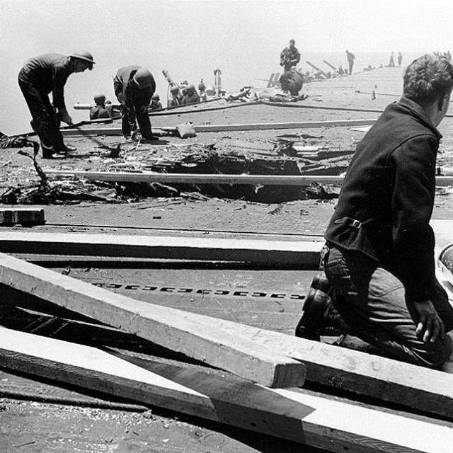 Repairing the flight deck Courtesy of the Naval History and Heritage Command Damage control teams struggle to repair the damaged flight deck of the USS Yorktown during the Battle of Midway.