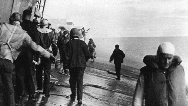 Abandoning ship Courtesy of the Naval History and Heritage Command The crew of the USS Yorktown dons life jackets before abandoning ship during the Battle of Midway.