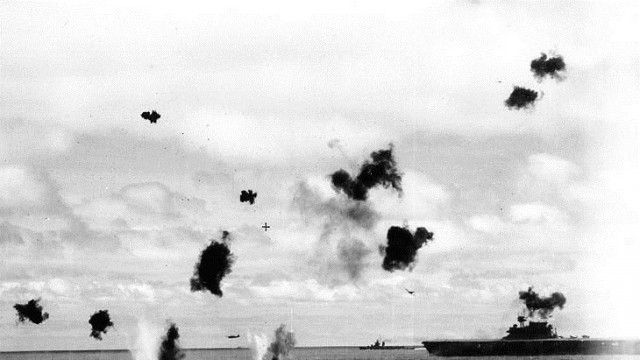 Torpedo attack Courtesy of the Naval History and Heritage Command Two Type 97 attack aircraft from the Japanese carrier Hiryu fly past the USS Yorktown amid heavy anti-aircraft fire after dropping their torpedoes during the mid-afternoon attack of 4 June 1942.