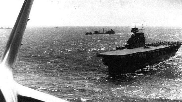 In the Coral Sea Courtesy of the Naval History and Heritage Command The USS Yorktown is shown operating in the vicinity of the Coral Sea, April 1942. The photograph was taken from from a TBD-1 torpedo plane that has just taken off from its deck.