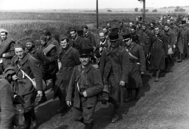 French prisoners are marched into internment