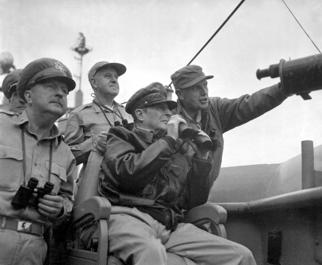 Gen. Douglas MacArthur, with other commanders, observe the shelling of Inchon from the U.S.S. Mt. McKinley, September 15, 1950.