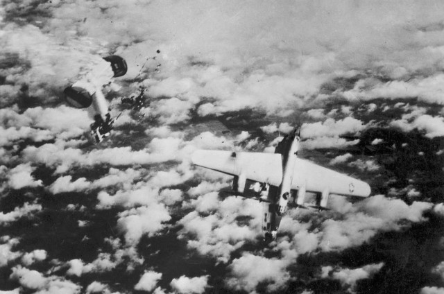 A Consolidated B-24, its rear fuselage blown off, begins its plunge to destruction on German soil. (U.S. Air Force photo)