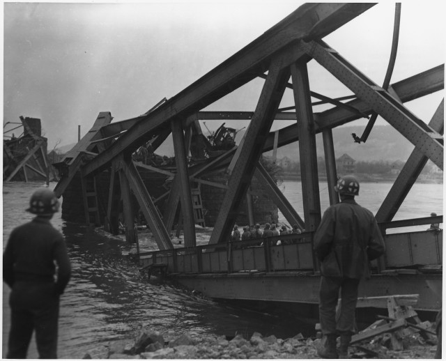 Medics wait for casualties after the collapse of the Ludendorff Bridge into the Rhine on 17 March 1945.