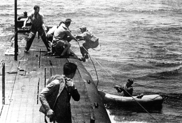 USS Tang rescuing airmen off Truk in May 1944.
