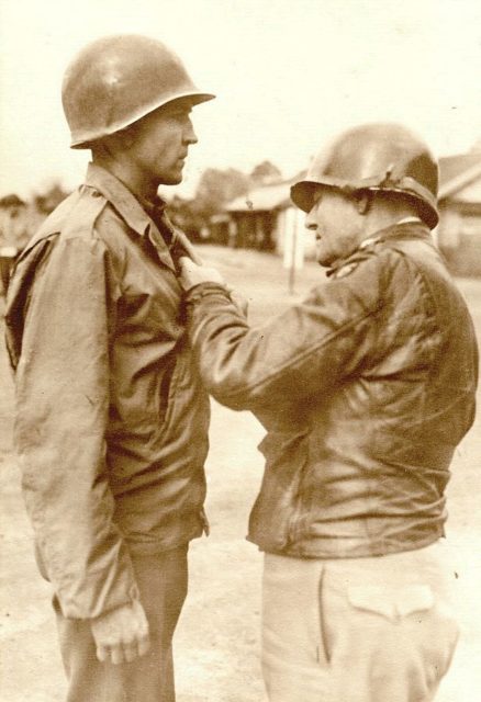 General Truscott pins Bronze Star on Captain Richard Wolfer in France, 1944.