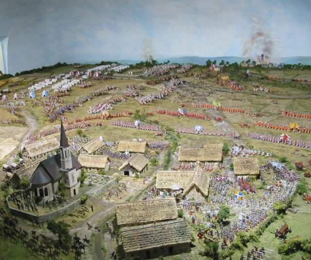 Diorama of the battle in the Höchstädt museum. In the middle ground the Allied cavalry are breaking through, pushing Tallard's squadrons from the battlefield. The foreground depicts the fierce fighting in and around Blenheim. Photo Credit.