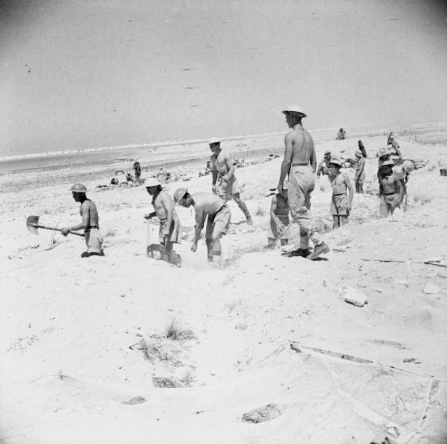 British troops dig in at El Alamein during the first battle. El Alamein, 1942 [via]