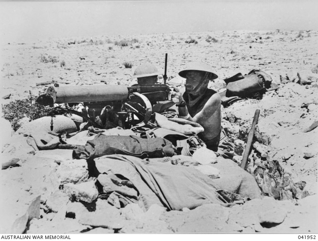 An Australian machine gun post near El Alamein in July 1942. The forward troops had to endure cramped conditions in slit trenches during the heat of the day, as movement above ground was impossible due to enemy fire [via]