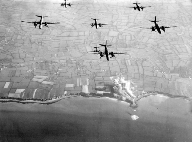 Pre-invasion bombing of Pointe du Hoc by 9th Air Force A-20 Havoc bombers.